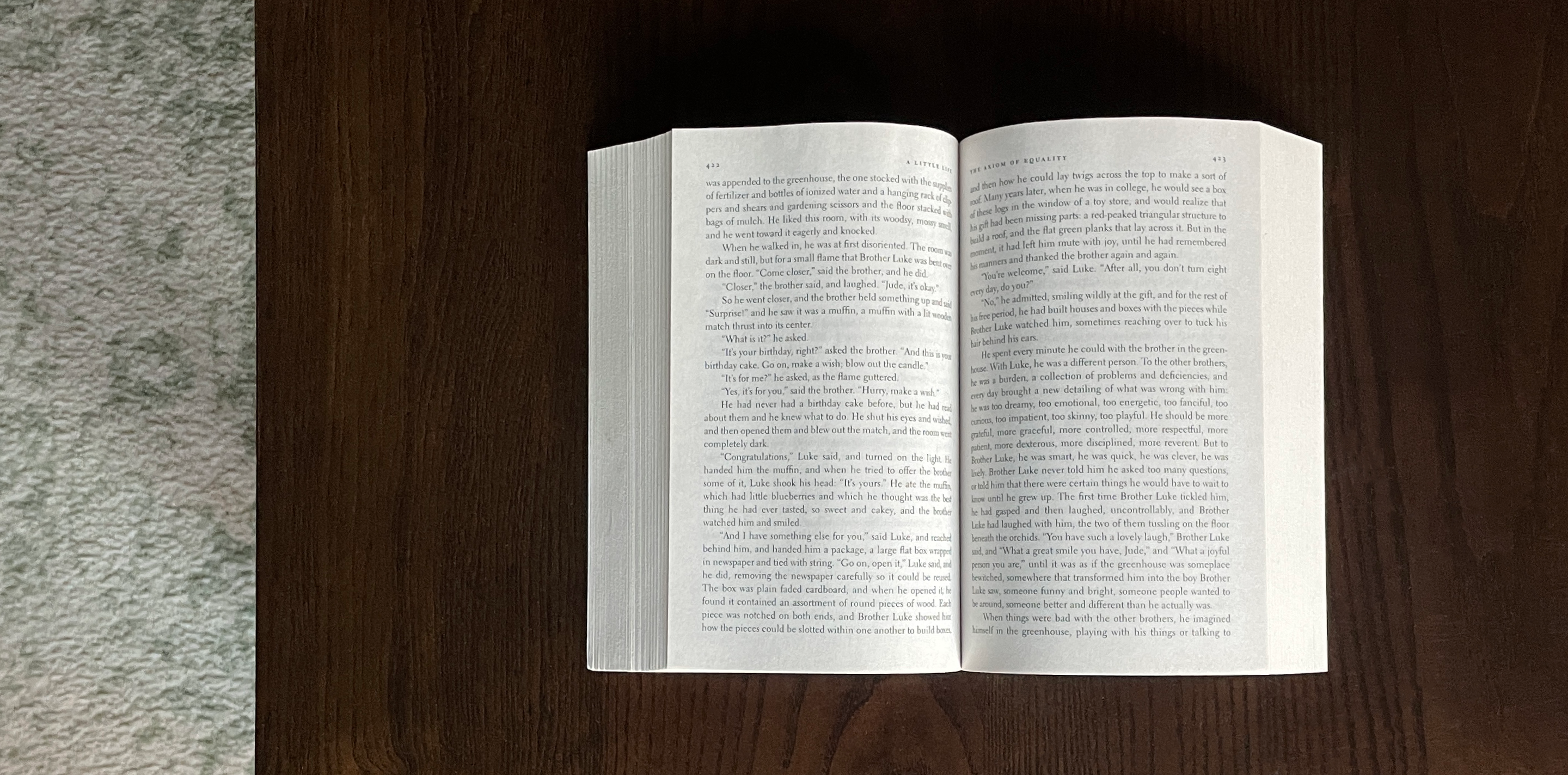 An open book sitting on a coffee table